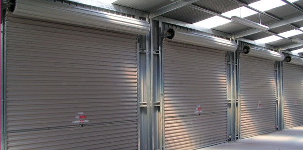 White electric roller shutter fitted to a domestic garage