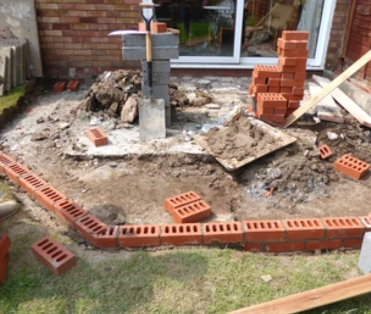 Conservatory base and brickwork under construction