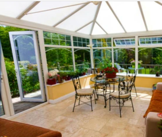 Bright uPVC conservatory interior with a glazed roof