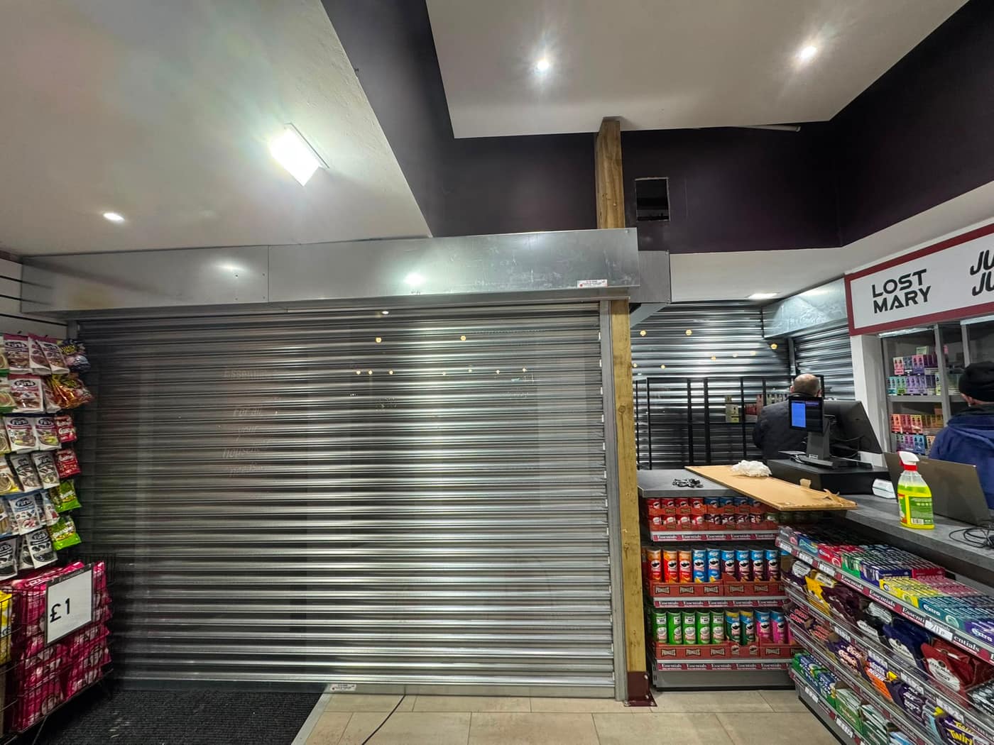 Security shutter protecting a convenience-store counter