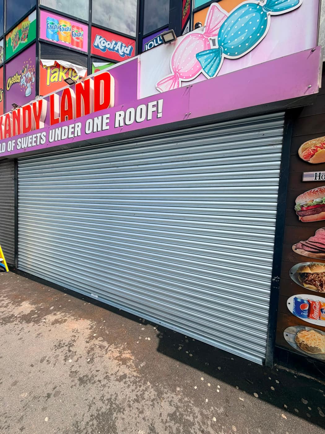 New galvanised roller shutter fitted to the shopfront