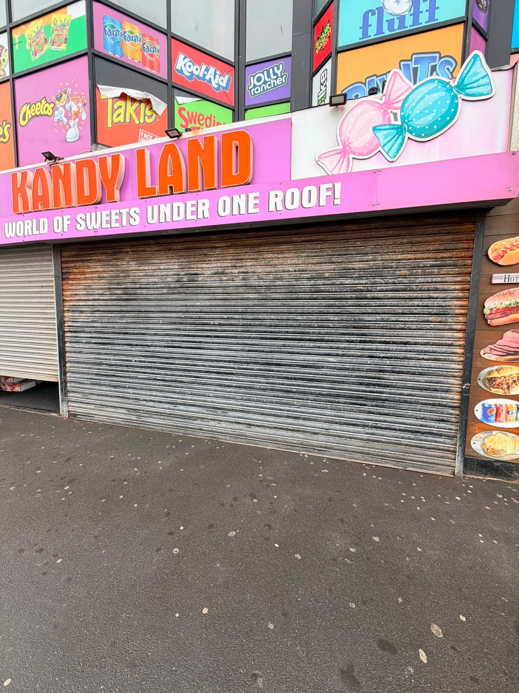Old worn shop roller shutter before replacement