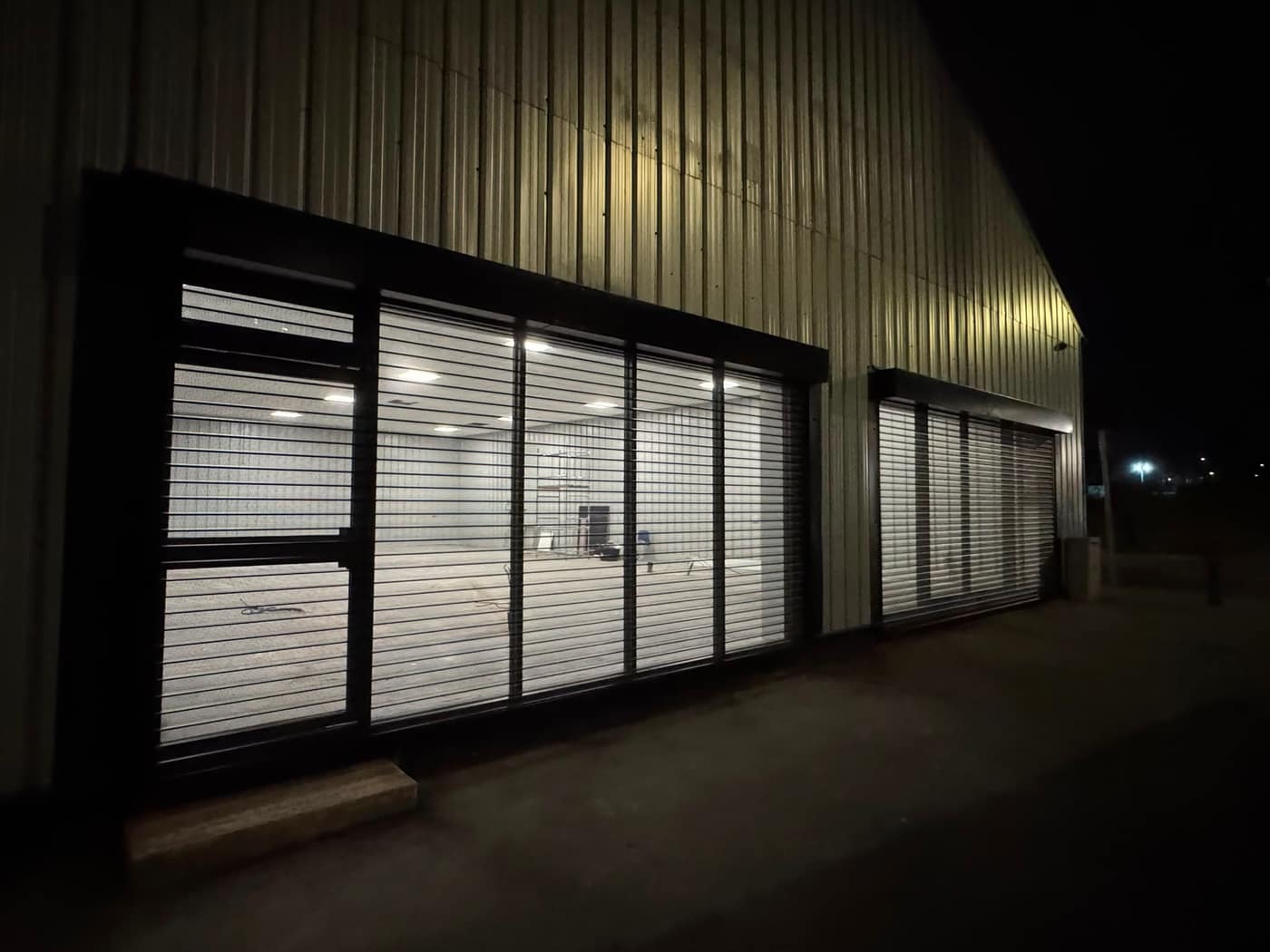 Shopfront with security shutters and glazing installed