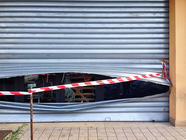 Roller shutter repair cordoned off with safety barrier tape