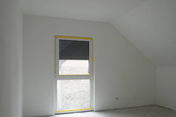 New double-glazed window in a converted loft room